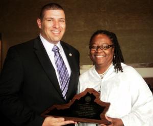  Scott Shuffelbarger, Legislative Director of the Virginia Assoc. of Roofing Professionals presents Senator Locke the Legislator of the Year Award.